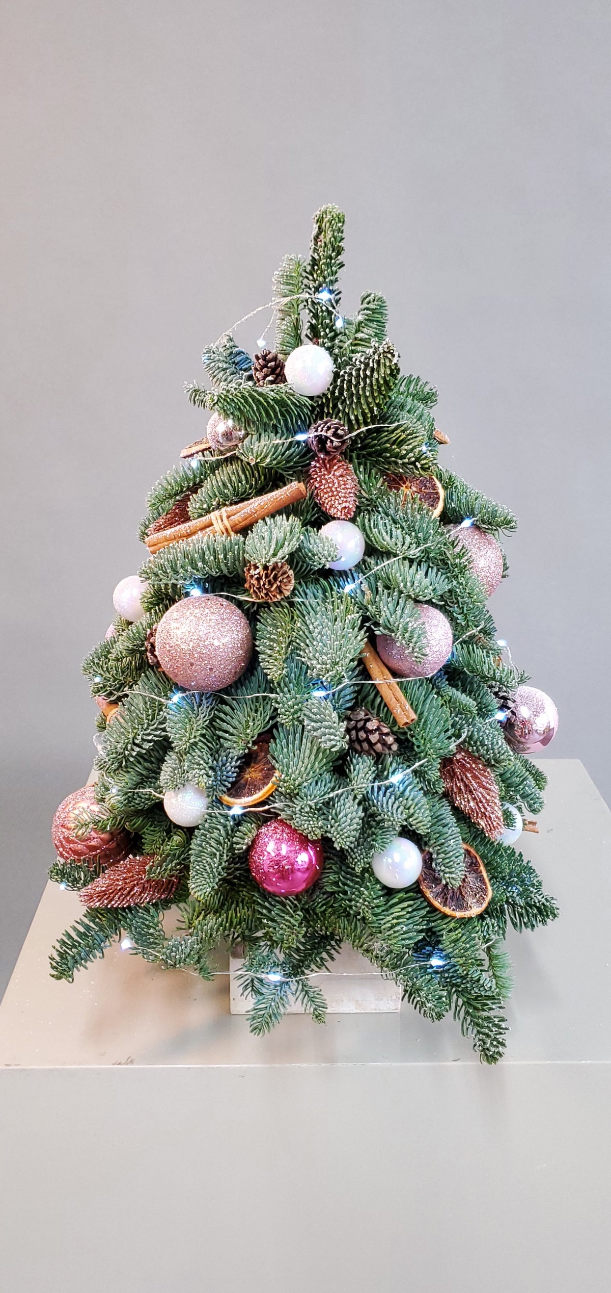 Noble Fir Christmas tree Pink/Rose Gold with lights